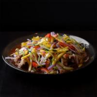 Burmese Fried Chicken · Battered fried boneless chicken thighs topped with fresh mango, red onions, and a sweet chil...