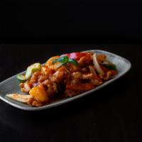 Sweet 'n Sour Chicken · Crispy chunks of chicken, pineapple, bell pepper mix, and tomato in a sweet 'n sour sauce.