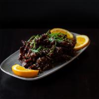 Sesame Beef · Strips of beef lightly fried in a sweet and tangy sauce, honey, vinegar, soy sauce, sliced a...