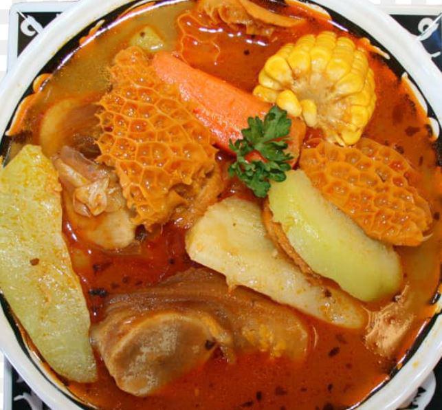 Sopa de Mondongo · Salvadorean style beef tripe soup with corn, and cabbage.
