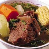 Sopa de Res · Beef rib soup with cabbage, carrot, cassava, corn, and seasoning.