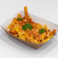 Elote Fries · French fries topped with Cotija cheese, mayo, sour cream, corn, chili pepper and cilantro. F...