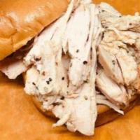 Pulled Turkey Sandwich · Pulled Season turkey breast with cracked black pepper. 