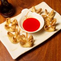 6 Crab Cheese Wontons · Cream cheese, imitation crab and minced white onions wrapped in wonton paper and deep fried. 