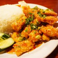 Sesame Chicken · Our version of sesame chicken is made with thick chunks of chicken, lightly battered and dee...