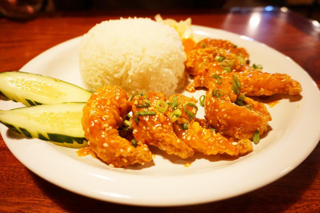 Sesame Shrimp · Our version of sesame shrimp is made with large butterflied shrimp, lightly battered and deep fried.  Then sautéed in a sweet and tangy sesame sauce.