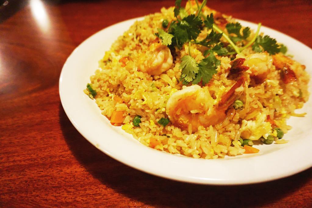 Fried Rice (com chien) · Jasmine rice stir fried to order with egg, peas, carrots, and green onions with your choice of meat.