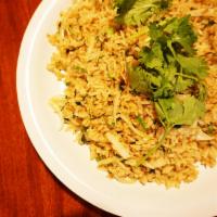 Crab Basil Fried Rice (Com Chien Cua) · Our signature fried rice is made to order with jasmine rice stir fried with yellow onions, t...