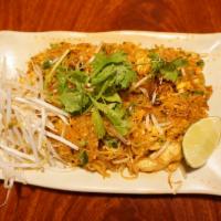 Pad Thai · Thin rice noodles stir fried in a tamarind sauce with egg, bean sprouts and green onions.  C...