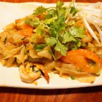 Drunken Noodles · Wide rice noodles stir fried in a soy based sauce with egg, bean sprouts, bell pepper, tomat...