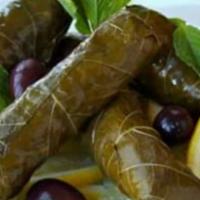 Grape Leaves Dolmas · 4 pieces. Our grape leaves are 100% vegetarian (no meat) made with scratch ingredients inclu...