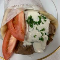 Gyros Sandwich · Sandwich is loaded inside a fluffy pita bread with gyro meat (90% beef, 10% lamb) lettuce, t...