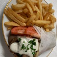Gyros Value Meal · comes with a pita on lettuce tomatoes, onions and tzaziki sauce as well as French fries.