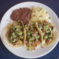 combination tacos · Chicken,Beef, Alpastor,Adovada or Carnitas. with beans and rice on the side