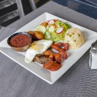 Montanero Plate · Served with sausage, egg, steak, rice, fresh salad, and beans.