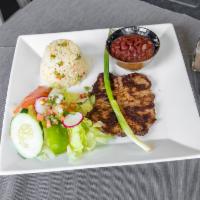 Grilled Beef · Served with rice, fresh salad, and beans.