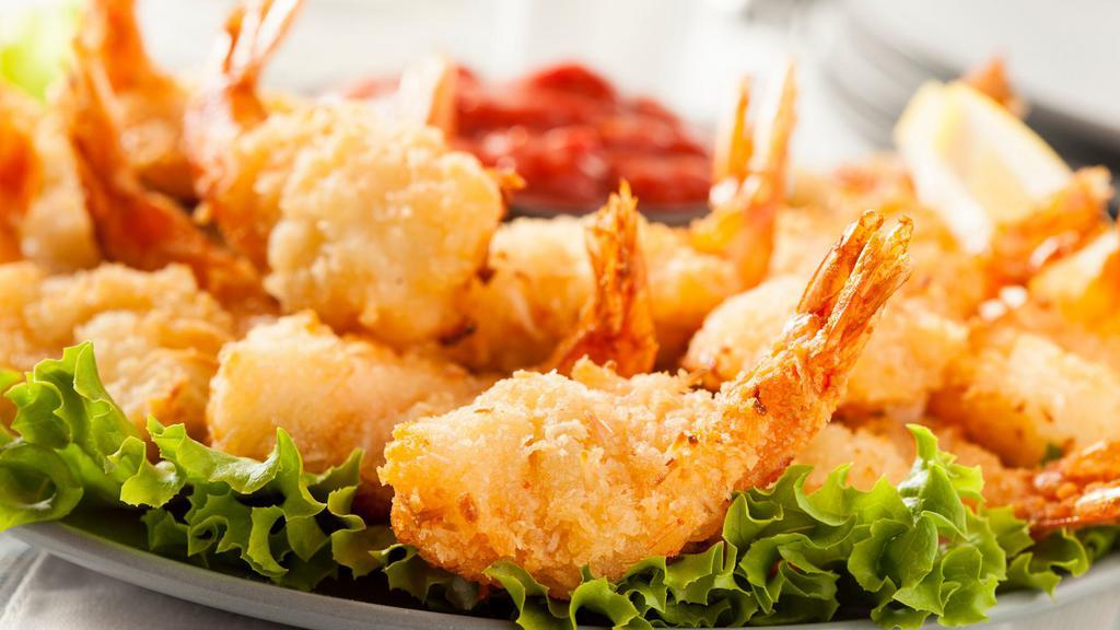 Giant Shrimp Platter · Nine butterfly, lightly breaded golden fried shrimp, served with housemade cocktail sauce and a choice of your favorite Sizzler side. 
