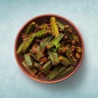 Okra Masala   · Okra sauteed with onions, garlic, and Indian spices till crisp. 