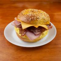 Breakfast Club-2 meats · Bacon, Sausage, 2 eggs, 2 slices of American cheese on your choice of bagel