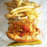 Pakaloha - Voted best dog in Az! · Bacon wrapped, nacho cheese, chili sauce, mustard, onion, crushed fritos and spicy pickle.