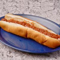 Footer · Foot-long hot dog, topped with mustard, onion, and sauce.  Served on a fresh steamed bun.