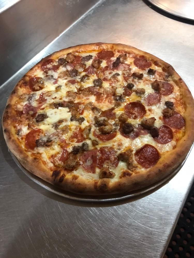 Meat Lovers Pizza · Sausage, pepperoni, salami, and beef.