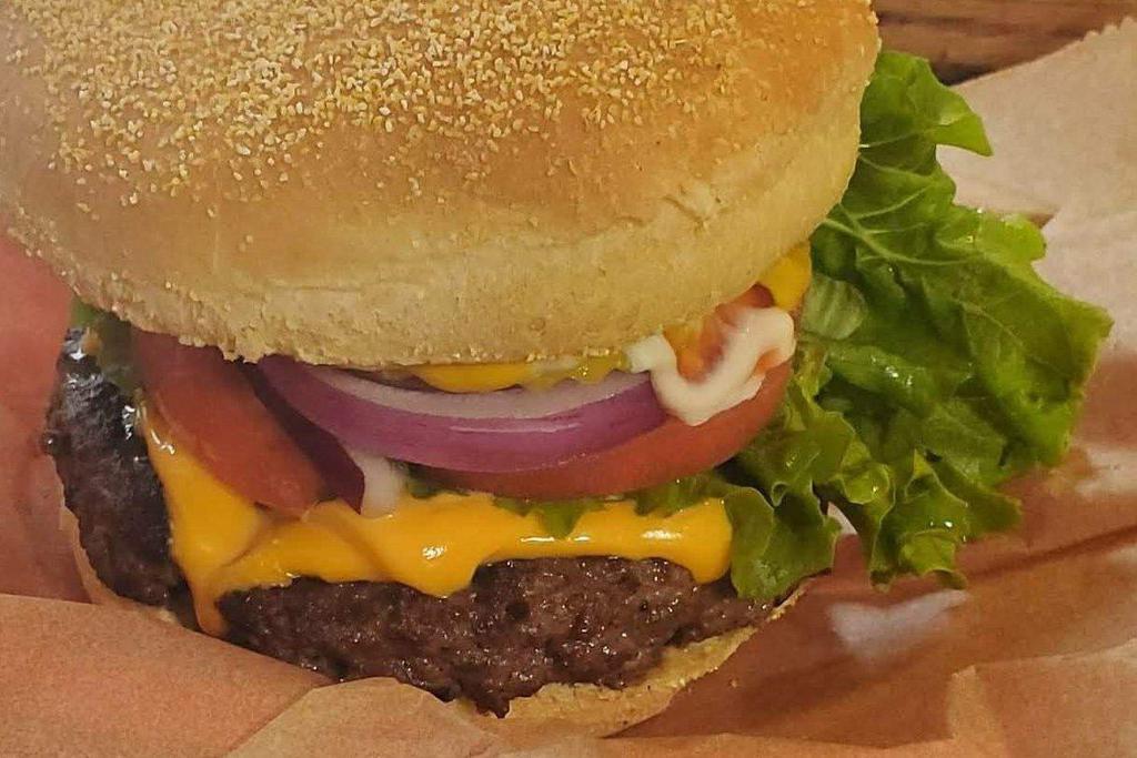 Triple Decker Cheeseburger · 3/4 lb cheeseburger with lettuce, onion, tomato, pickle, ketchup, mustard, mayo