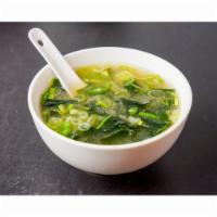Miso Soup · Soybean with tofu, dried seaweed, and scallions.