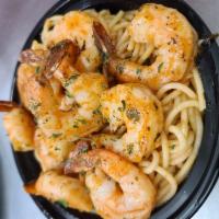 Shrimp Scampi Rosato · A hearty portion of spaghetti with shrimp sauteed in a rich garlic butter sauce. Served with...