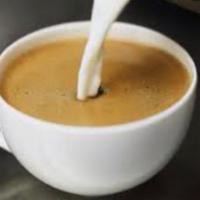 Cafe con leche · Coffee with milk.