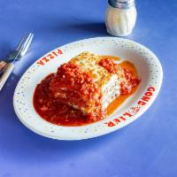 Baked Lasagna · Several layers of tender cooked pasta, sauteed meat, and a variety of cheeses baked.