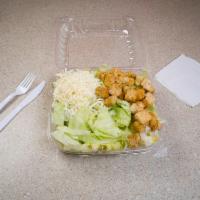 Caesar Salad · Romaine lettuce with creamy Caesar salad dressing, croutons and Parmesan cheese.