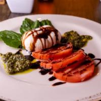 Burrata · Locally sourced, basil & pine nut pesto, balsamic reduction. Toasted baguette.
