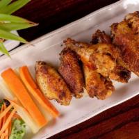 Baked Chicken Wings · Honey Sriracha or Buffalo style. 
Carrots, celery & blue cheese dressing.
