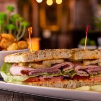 Lyon Sandwich  · Smoked Black Forest ham, salami, prosciutto, pickle, lettuce, tomato and onion, served on fo...