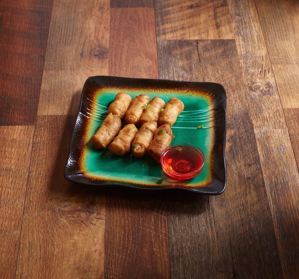 A. 8 Pieces Pau Pia · Spring rolls, miniature egg rolls made with bean vermicelli, egg, bamboo shoots and served with sweet and sour sauce.
