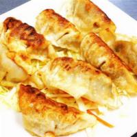 3. Pan Fried Dumplings · 6 pieces.