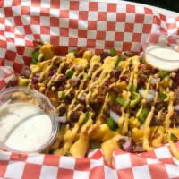 Fully Loaded Fries · French fries topped with bacon, beef, onion, and nacho cheese. Comes with ranch sauce for di...