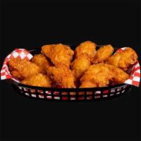 10 Piece Chicken Wings · Jumbo wings tossed in your choice of Buffalo or BBQ. Comes with your choice of dipping sauce...