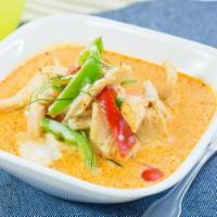 64. Panang Curry · With coconut milk, lime leaves, bell peppers, pea and carrot and panang curry paste. Include...