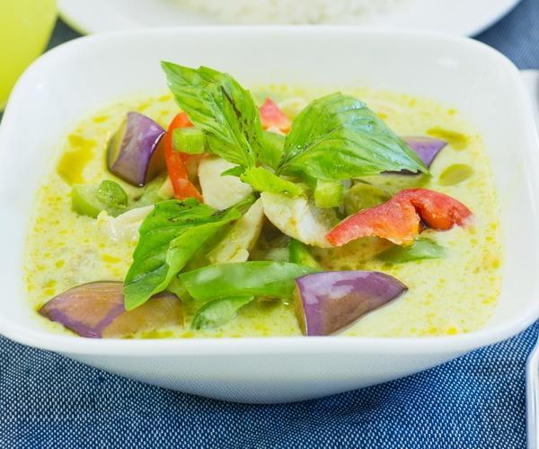 65. Green Curry · With sliced bamboo shoots, bell pepper, zucchini, basil leaves, green curry paste and coconut milk. Includes white or brown rice. Hot and spicy.