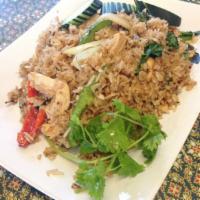 72. Spicy Fried Rice · Fried rice with basil, bell peppers, onion and chili.