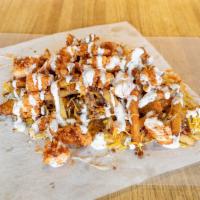 Buffalo Chicken Fries · Shared order of hand cut fries topped with chopped, fried Buffalo Chicken, Shredded Cheese, ...