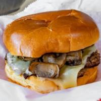 The Mushroom Swiss Burger · One 100% fresh Certified Angus Beef patty with Swiss cheese and fresh grilled mushrooms on y...
