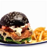 Levin Truffle Burger · 10 oz. of hand-cut picanha 100% wagyu with lettuce, tomato, truffle oil, ketchup, bacon and ...