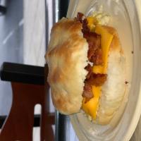 Bacon Biscuit · Golden delicious biscuit made from scratch with crispy bacon with your choice to add egg, ch...
