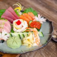 Signature Sashimi  · 15 pieces assorted raw fish of chef's choice.