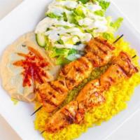 3. Chicken Kebob · 2 skewers of all white chicken breast marinated overnight in spices and herbs.