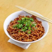 Sizzling Garlic Dry Noodle · House made spicy garlic sauce, topped with green onion and cilantro. Vegan.