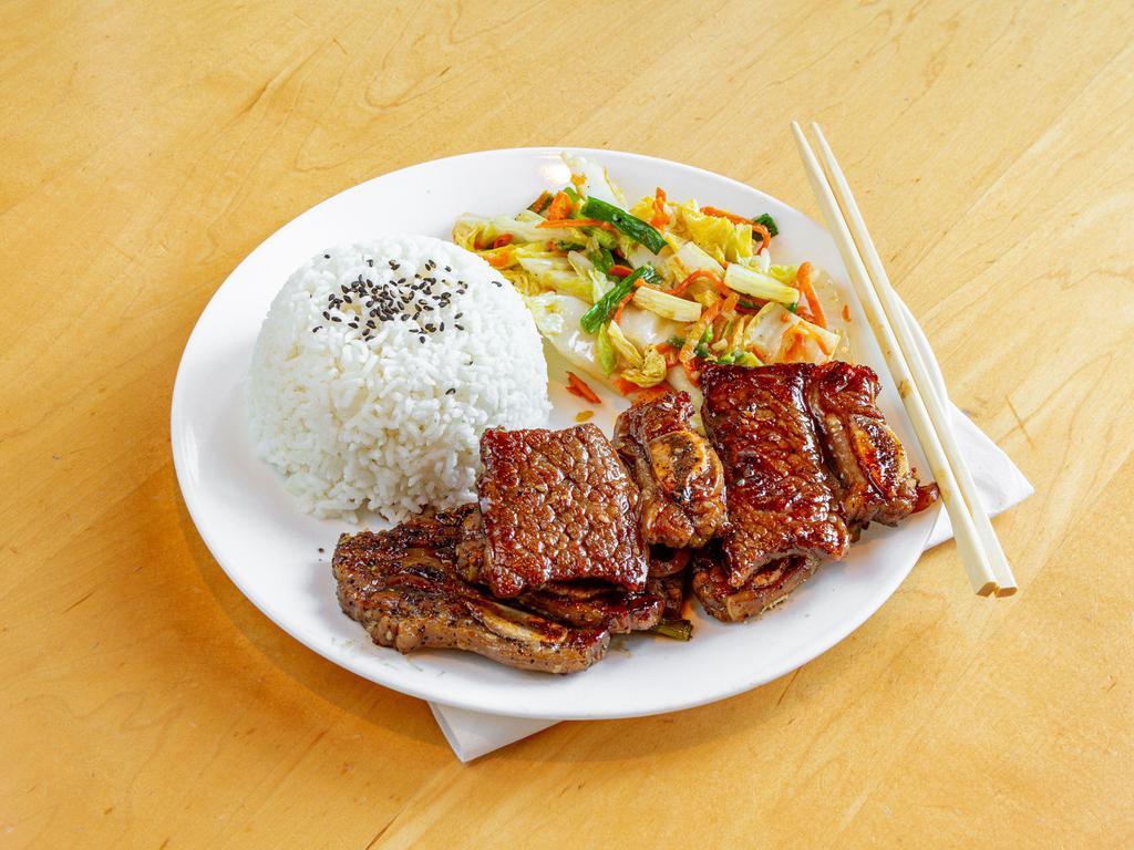 Mongolian Beef Short Ribs · Grilled marinated beef short ribs, served with seasonal Asian veggies and a choice of white or brown rice.